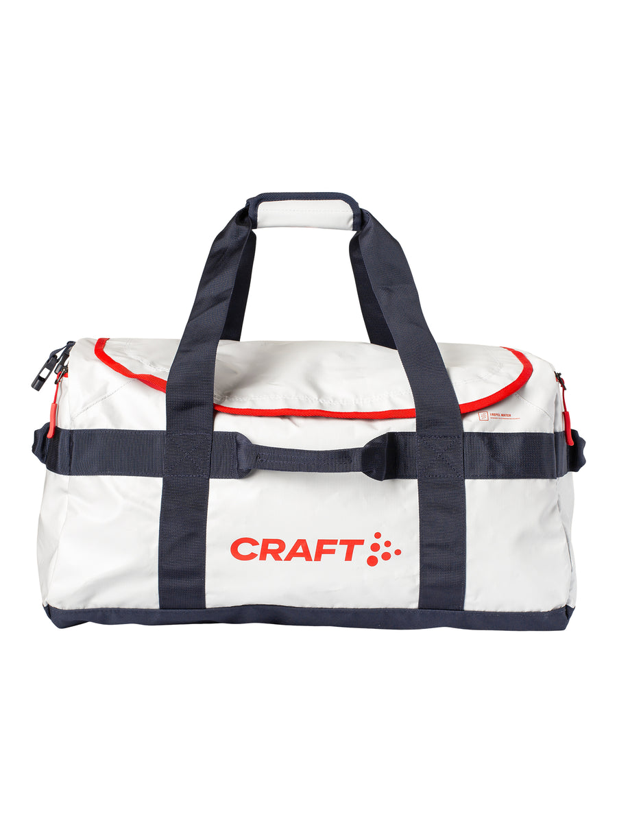 Craft NOR ADV Entity Duffel 70 L – Blaze / Hvit, forside